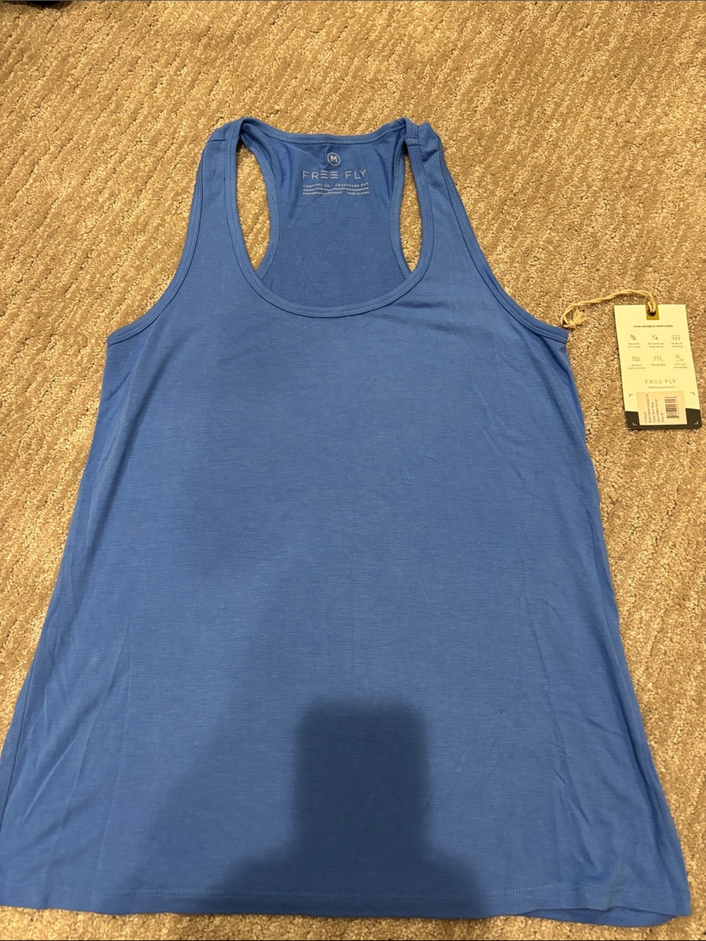 NWT Free fly bamboo racer back tank. Surf blue size medium.